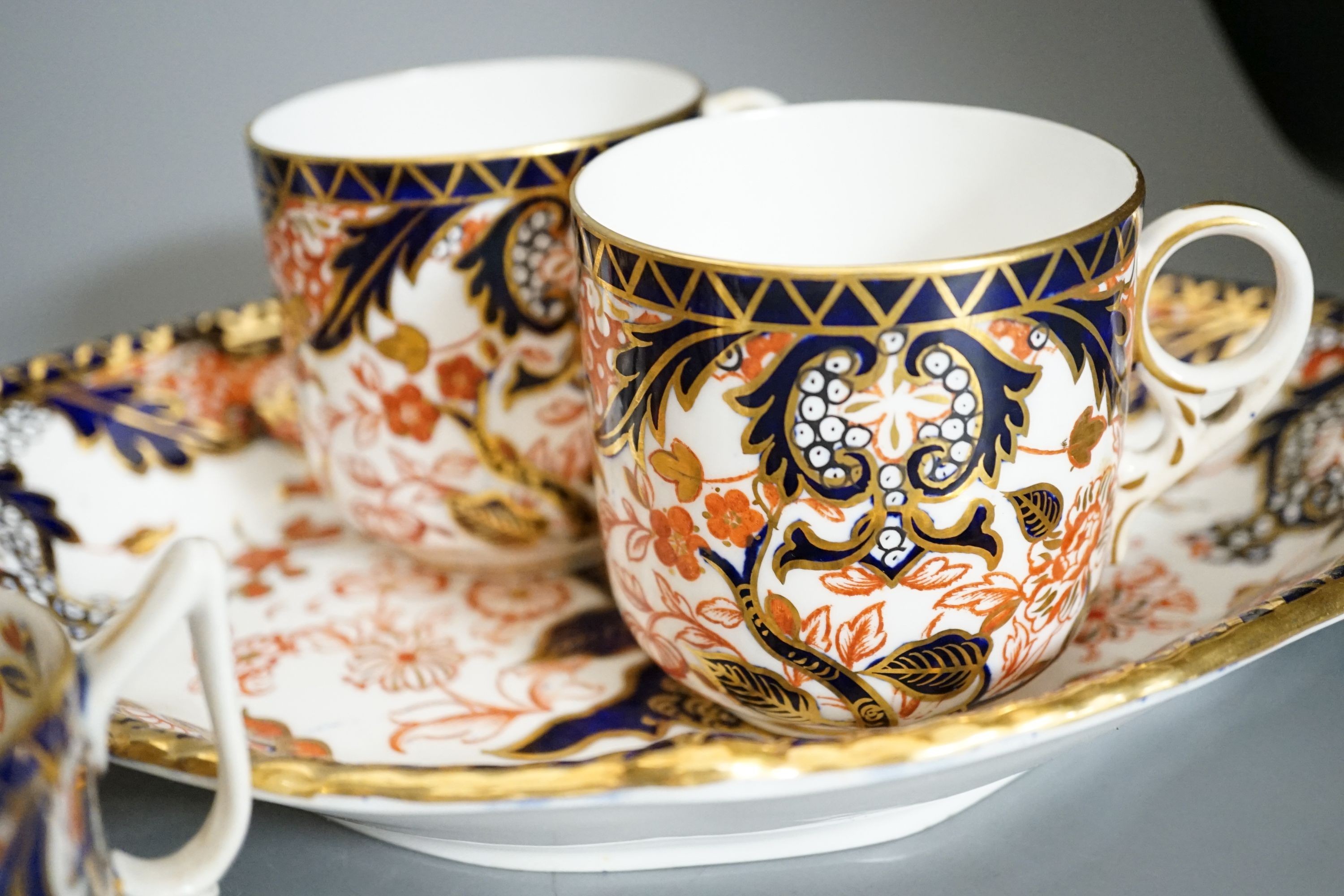 A collection of 19th century Derby Imari pattern tea, coffee and breakfast wares, predominantly pattern number 387
